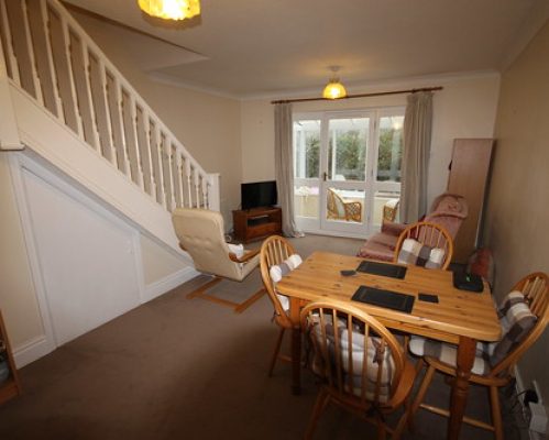 Lounge with sofas & dining table